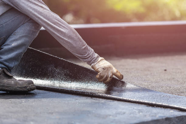 Professional Basement Waterproofing technician working in East Concord, NY